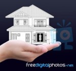 casa en la mano